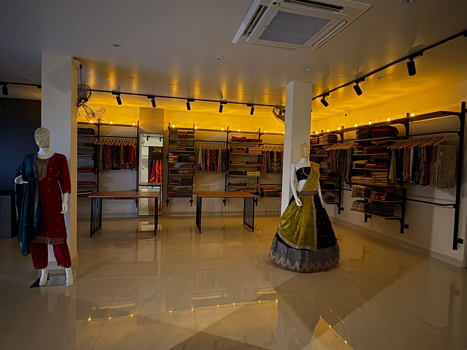 Limited-edition saree weaves displayed in-store