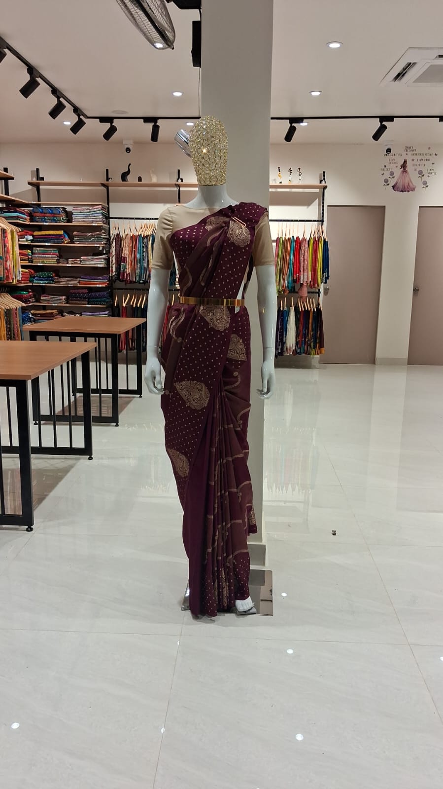 Red dupatta green lehenga mannequin close-up