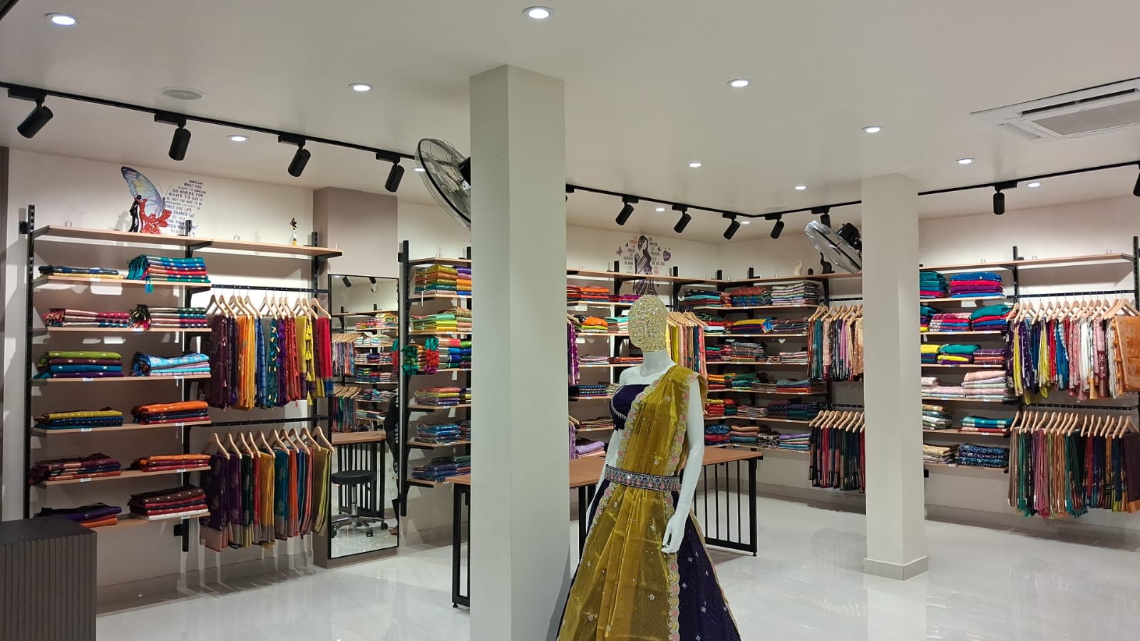 Store exterior at night with glowing signage